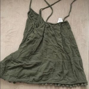 Cute tank with Pom detailing on bottom